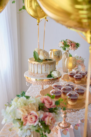 A vertical shot of a festive table decorated with sweetsの写真素材