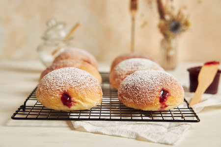 A closeup of Marmelade buns on a metallic bar