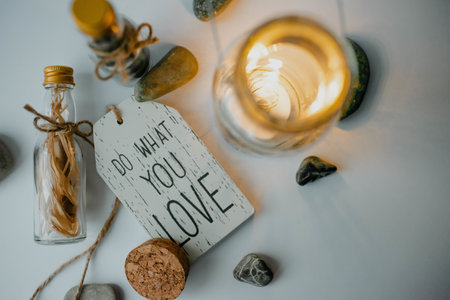 A closeup shot of a jar with the text live laugh love in a decoration setの写真素材