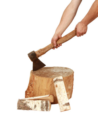 A vertical shot of a person chopping wood with an axeの写真素材