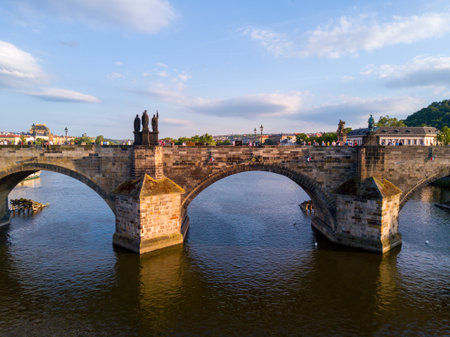 The Charles Bridge over the Vltava river under the sunlight in Prague, the Czech Republicの写真素材
