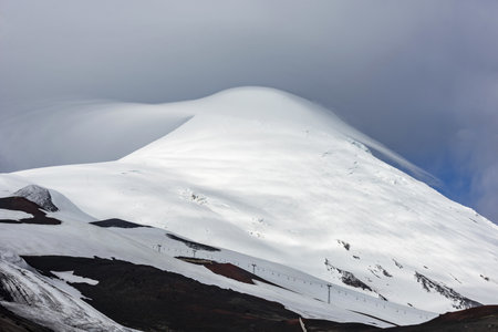 A beautiful winter alpine landscape scenery of snow-capped mountains in the countrysideの写真素材
