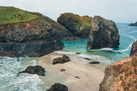 An aerial shot of the Kynance Cove located in the UKの写真素材