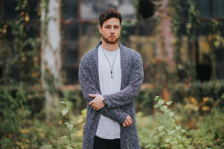 A shallow focus shot of a young and attractive male posing at cameraの写真素材