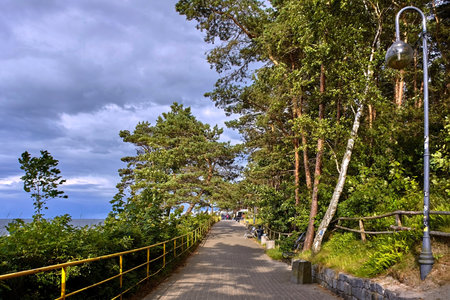 Boulevard of Polish Radio Program I (Bulwar Radiowej Jedynki) with benches named after the popular broadcasts of the Polish Radio Program I.の写真素材