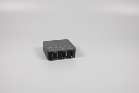 A closeup shot of a black USB charging hub isolated on a white background