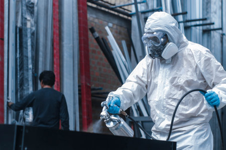 An industrial painter working in a factoryの写真素材