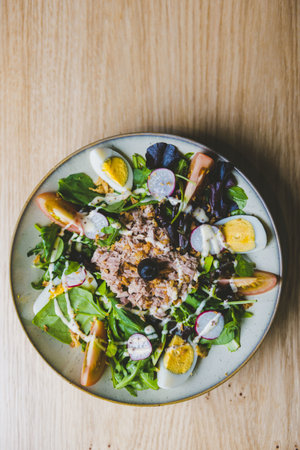 A closeup shot of Spanish salad on the tableの写真素材