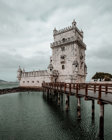 A vertical shot of the historic Belem Tower in Lisbon, Portugalの写真素材