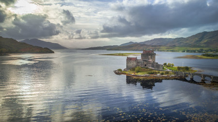 Beautiful Scottish castle  during a sunny afternoon in Scotland taken along the green and yellow...