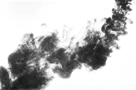 A closeup shot of blac ink in the waterの写真素材