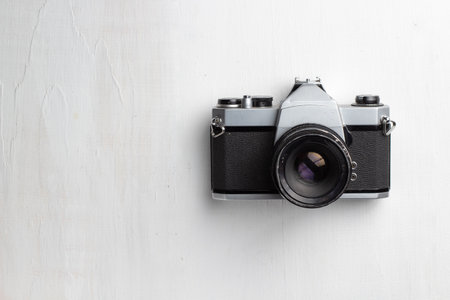 A top view of a professional camera on the tableの写真素材