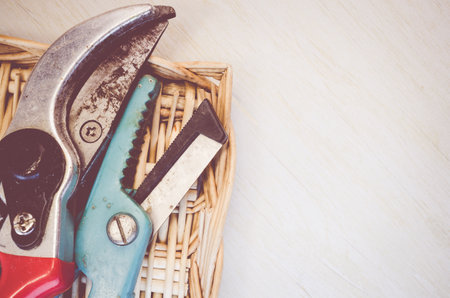 A top view of rusty gardening tools on a tableの写真素材
