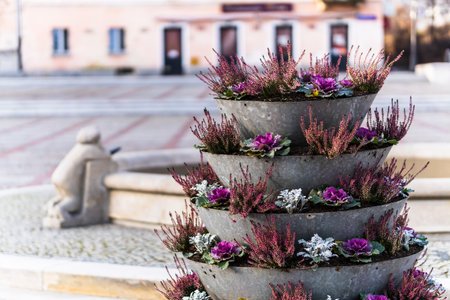 A beautiful tower flowerbed with succulent plants and flowersの写真素材