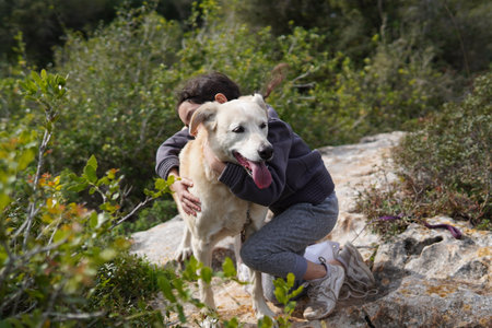 A cute dog with the owner resting in the a