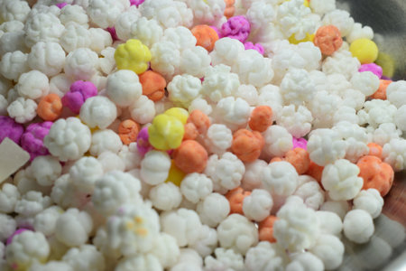 A closeup shot of some colorful sweets in a glass plateの写真素材