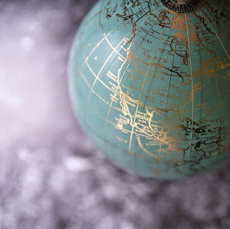 A high angle shot of a beautiful decorative globe on the soft blurred backgroundの写真素材
