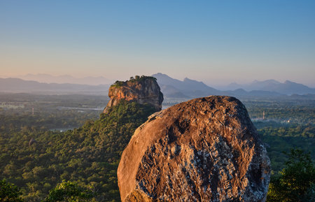A beautiful shot of the Sigiriya rock fortress in Sri Lanka during sunriseの写真素材