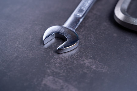 A closeup shot of wrench on gray background