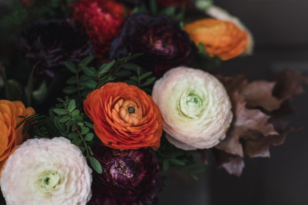 A selective focus shot of a beautiful flower composition in a vase