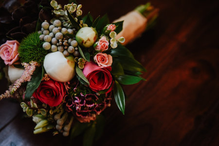 A closeup shot of a beautiful wedding bouquet on a blurred backgroundの写真素材
