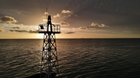 golden sunset on the light towerの写真素材