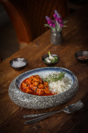 A vertical shot of the traditional Bulgarian dish Vinen Kebap with meat and riceの写真素材