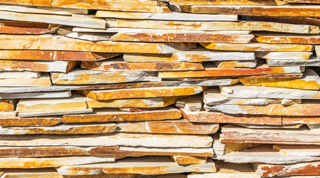 A closeup shot of yellow rock wall