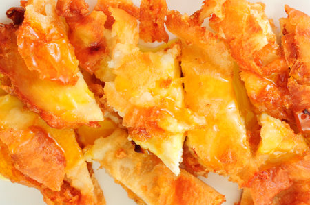 lemon chicken battered and deep fried with lemon sauceの写真素材