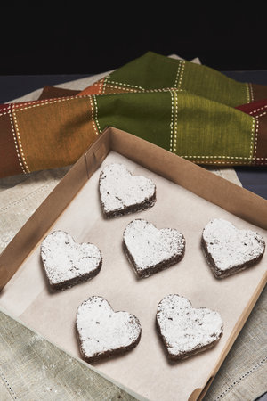 A box full of heart-shaped cookies for Valentine's dayの写真素材