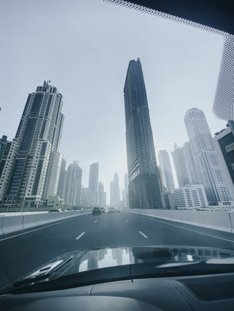 A vertical low angle shot of skyscraper captured during the daytimeの写真素材