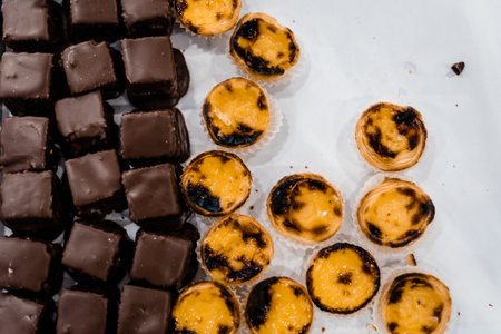 An overhead shot of two types of tasty desserts on a white surfaceの写真素材