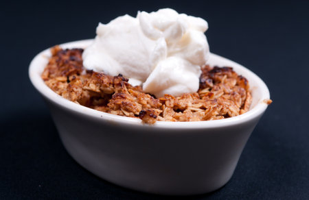 apple crumble dessert with whipped creamの写真素材
