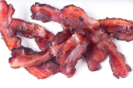crispy thick cut smoked bacon slicesの写真素材
