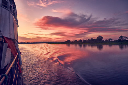 A mesmerizing view of the sea near the coast at sunsetの写真素材