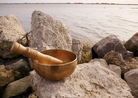 Metal singing bowl for relaxing and receiving healing vibrationsの写真素材