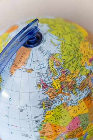 A vertical closeup shot of rotary world globe modelの写真素材