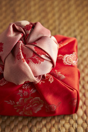 A vertical selective focus shot of red gift boxの写真素材