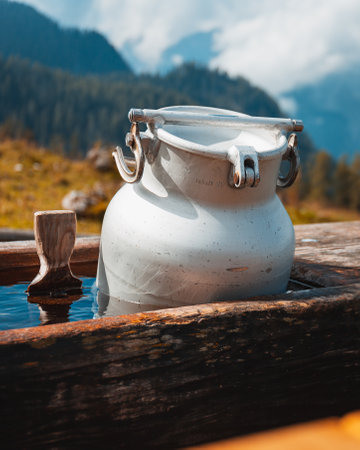 A vertical closeup shot of a white tank on a mountainsideの写真素材