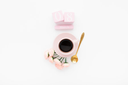 An overhead shot of a Women's day decoration set with a cup of coffeeの写真素材