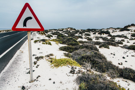 a road sign in Caleton Blanco beach, Lanzarote, Canary Islands, Spainの写真素材