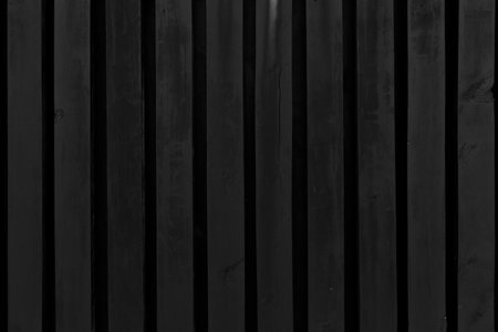 A closeup shot of black vertical wood planksの写真素材