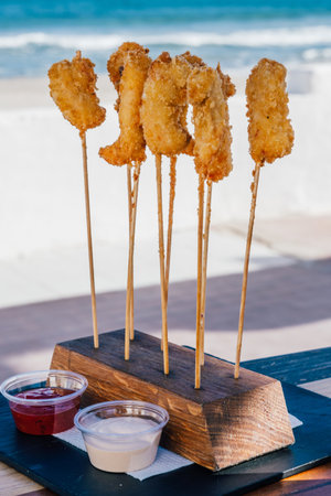 A closeup shot of typical spanish food called Caballitos with frybread prawns in La Manga del Mar Menor, Murcia, Spainの写真素材