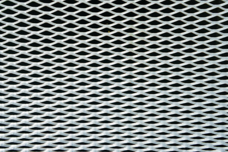 A close-up of abstract geometric pattern on black backgroundの写真素材