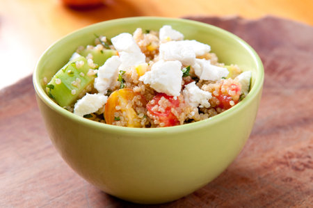 gluten free vegetarian salad made with quinoa and fresh heirloom tomatoesの写真素材