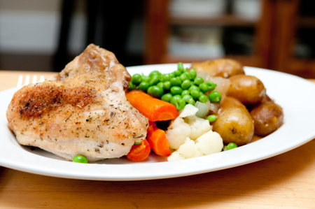 farm fresh vegetables with roasted chicken and fingerling potatoesの写真素材