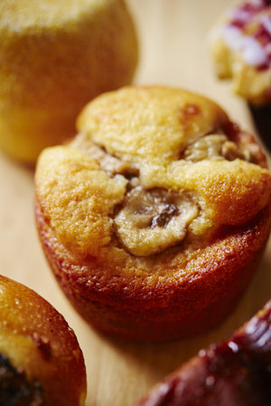 A closeup shot of a homemade sweet muffin on a blurred backgroundの写真素材