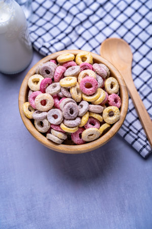 A closeup shot of colorful round cereals on the bowlの写真素材
