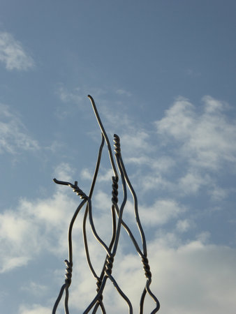The simplicity of a wire sculpture, in the old town of Barcelona, ââCatalonia,Spain.の写真素材