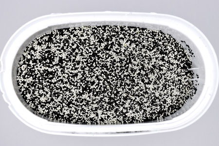 looking Inside of an activated charcoal water filter for domestic water purificationの写真素材